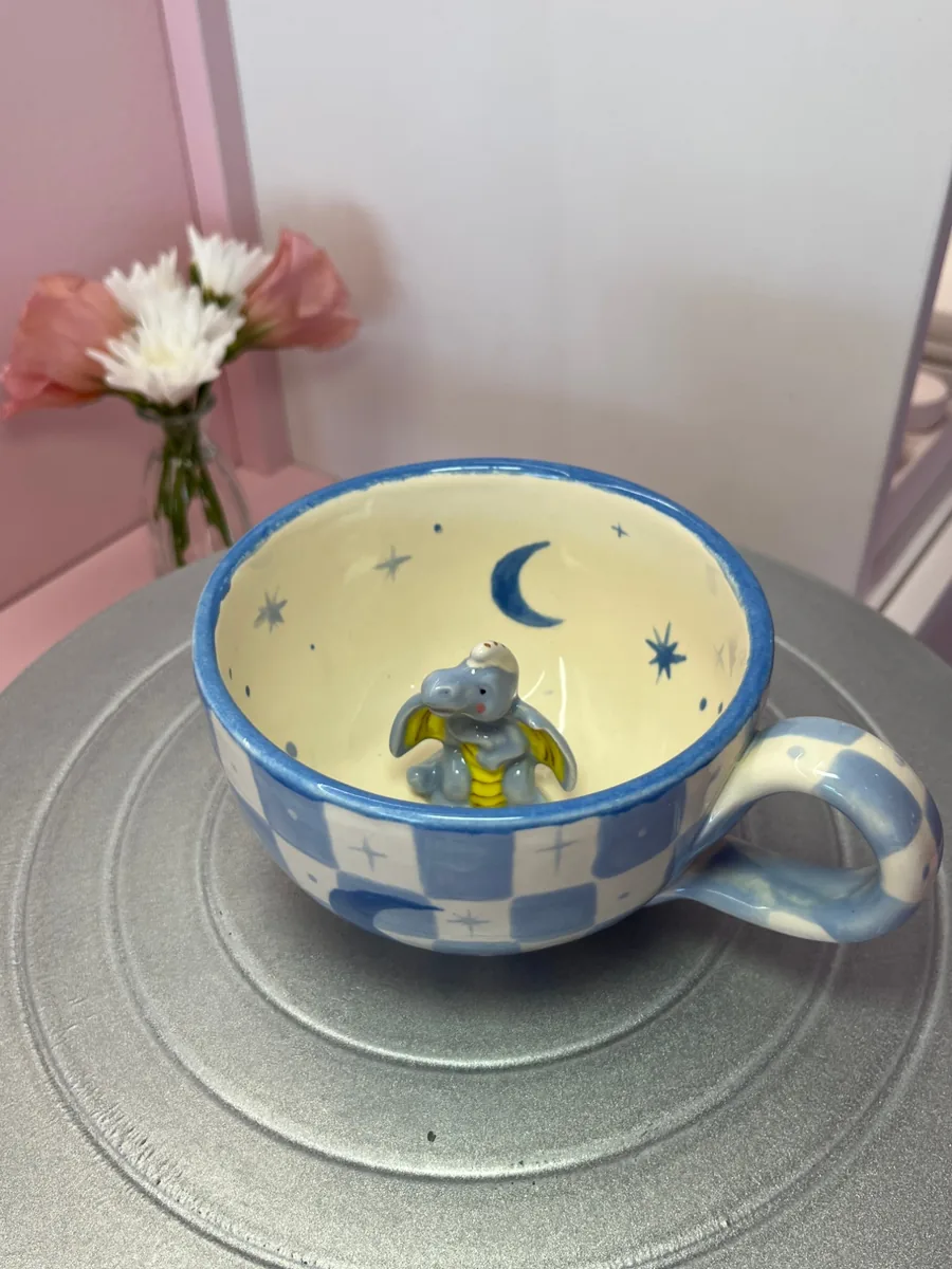 Dragon inside a mug